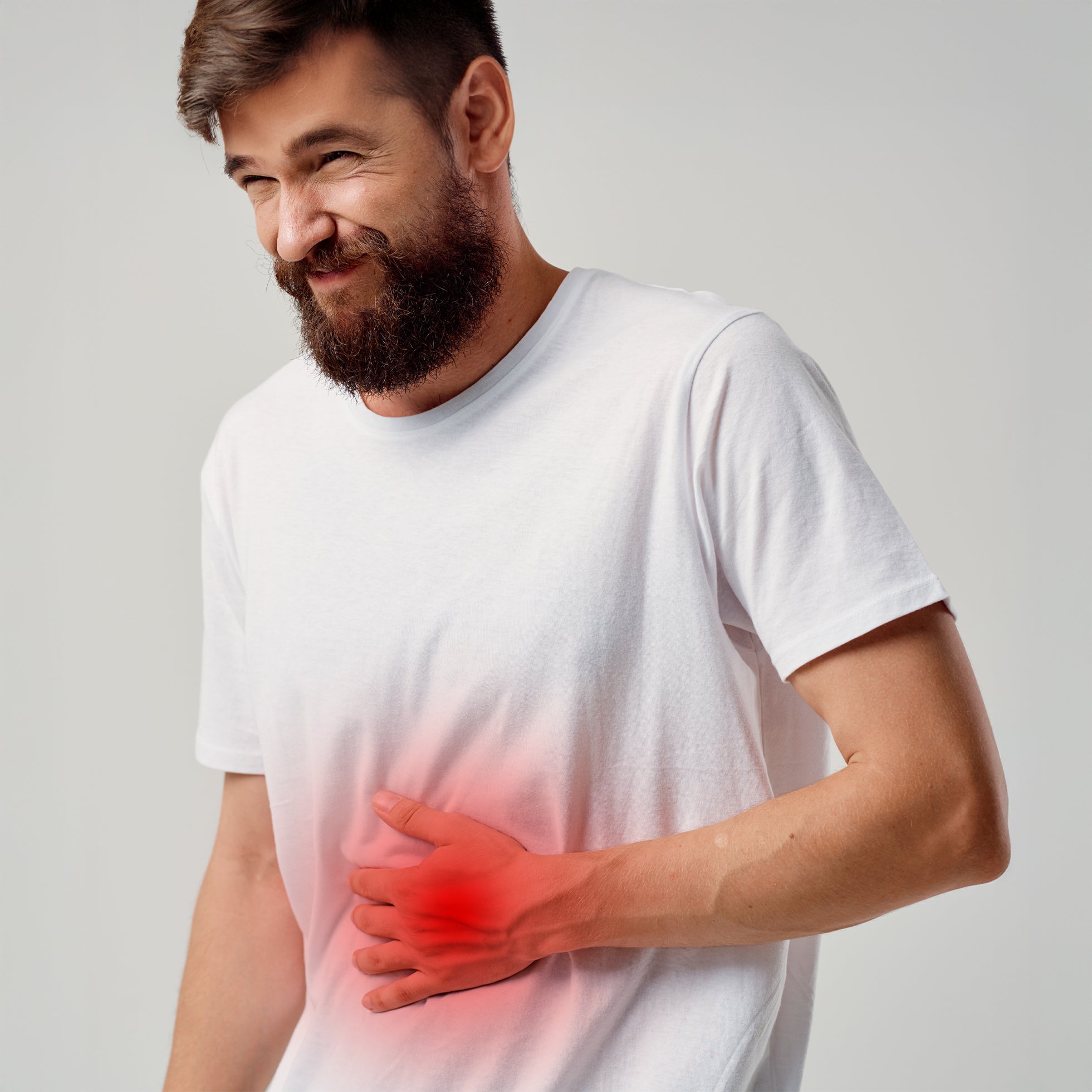 hombre dolor estomago intestino portada test microbioma intestinal clinico